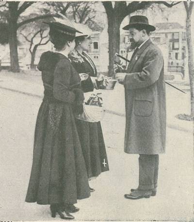 A sr.ª D.ª Maria de Macedo e Brito de Romero vendendo flores ao poeta e deputado Jaime Cortesão.